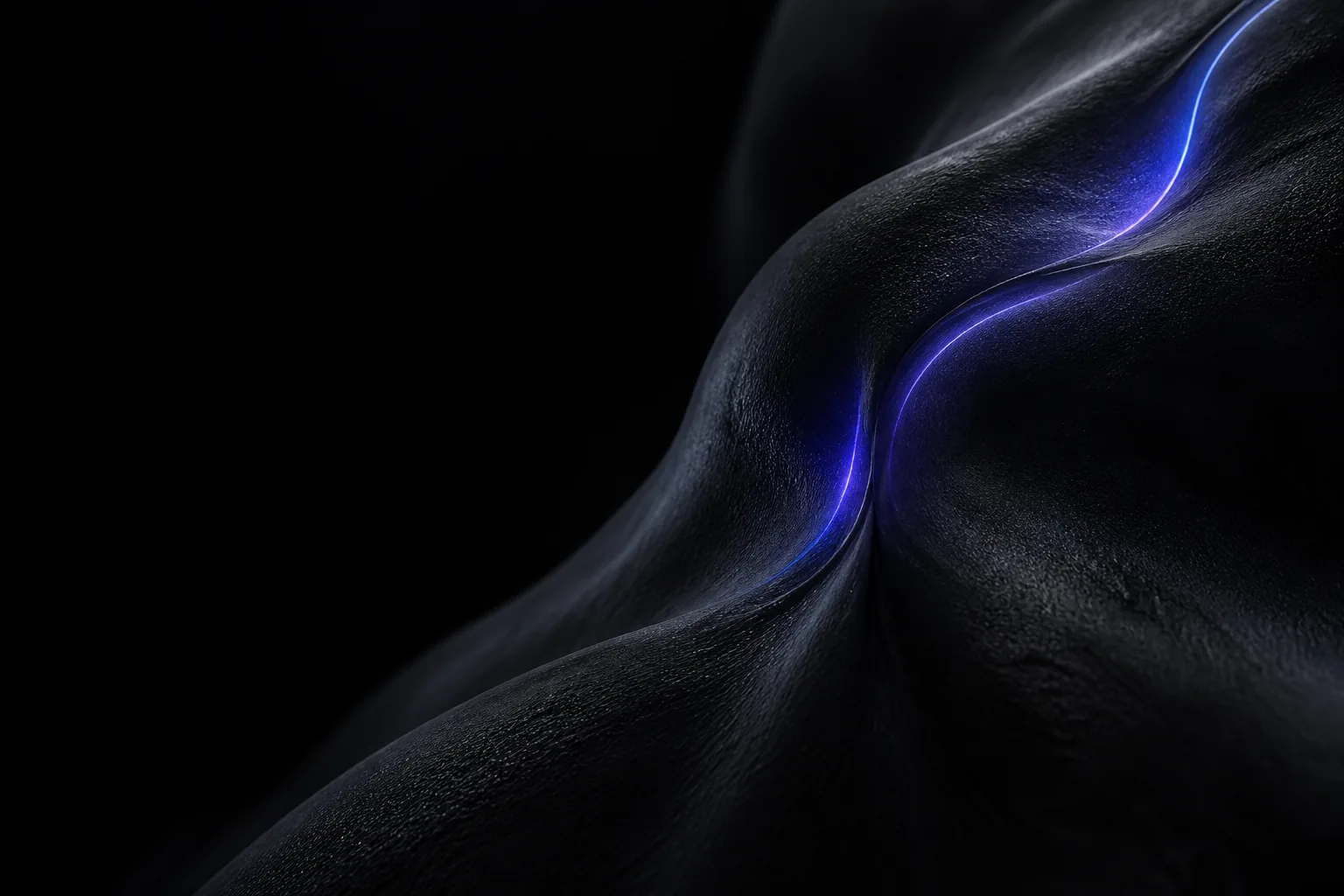 A fine blue thread of energy hidden beneath a dark surface.
